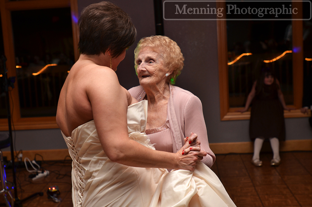 grandma dancing with granddaughter at wedding