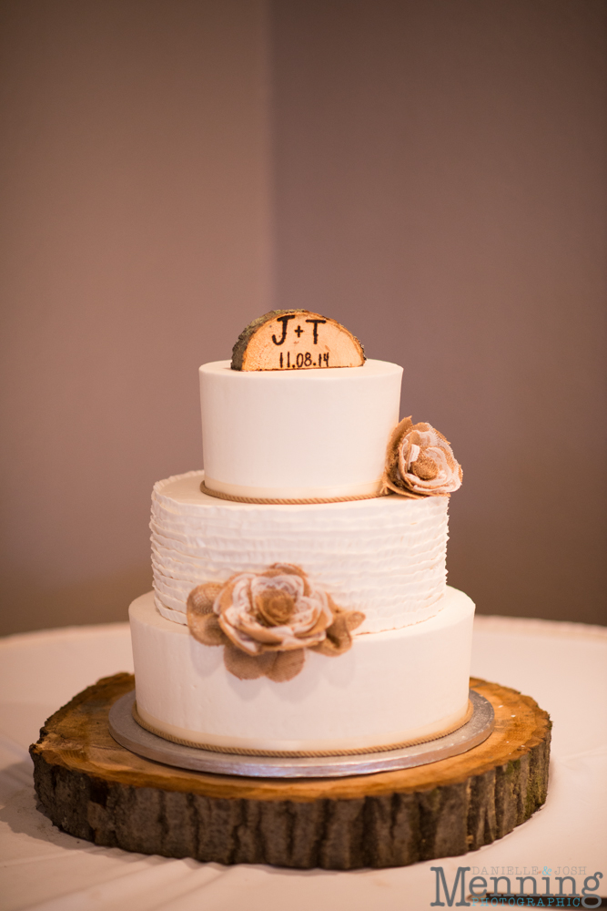 rustic wedding cake with wood stump cake topper