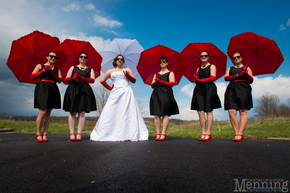 bridal party with umbrellas