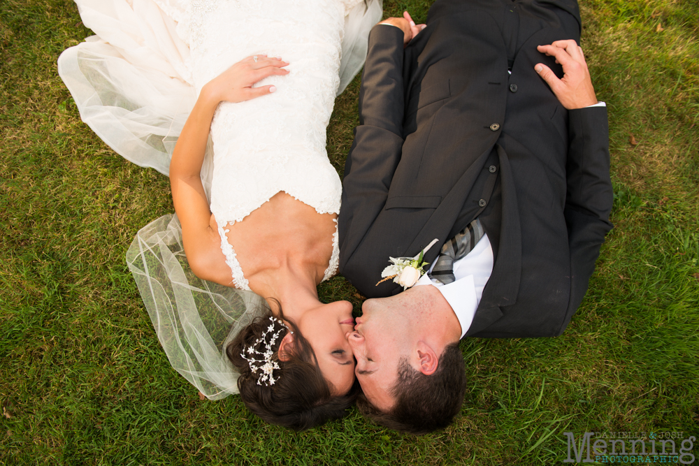 bride and groom laying down