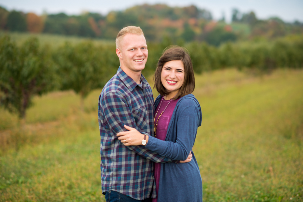 fall apple orchard engagement photos