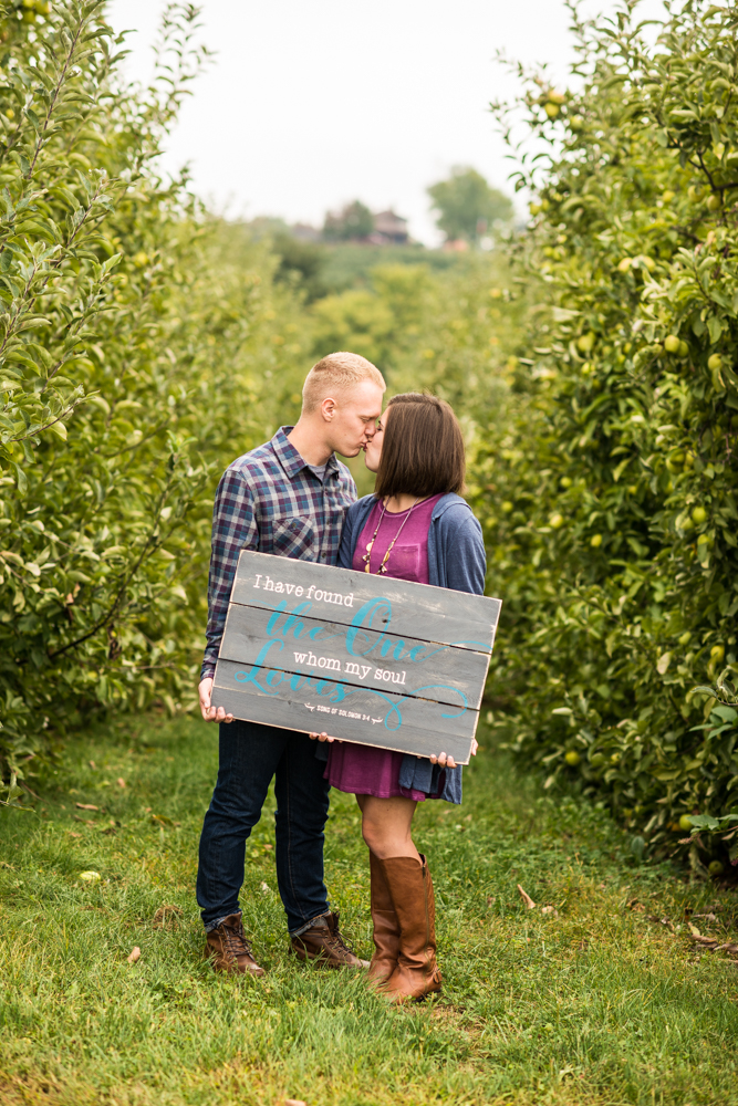 fall apple orchard engagement photos