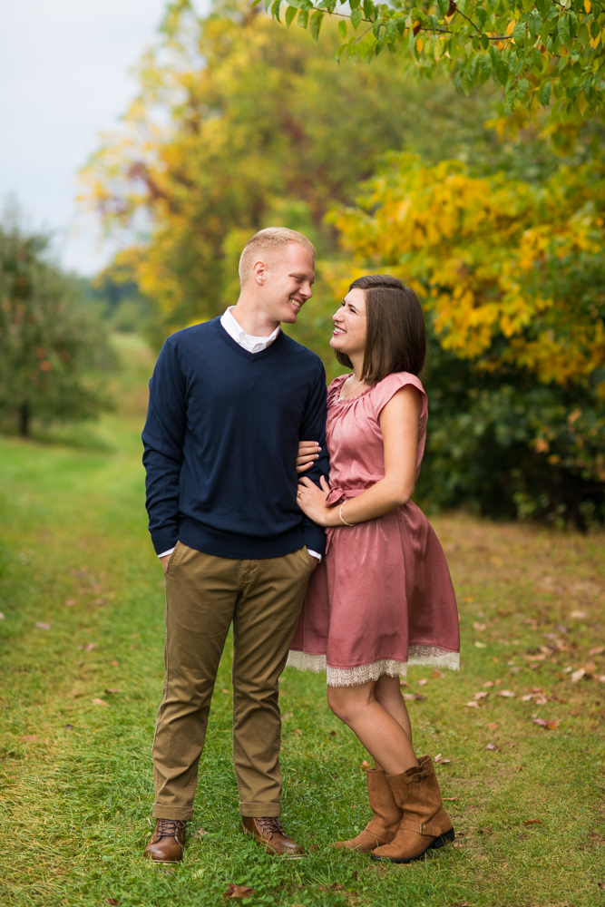 fall apple orchard engagement photos